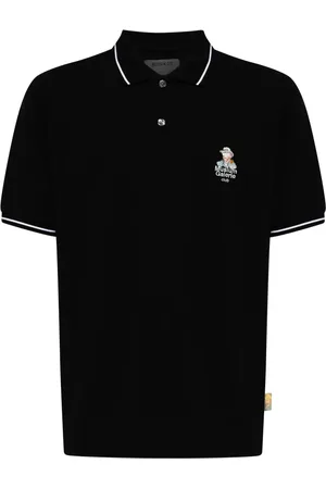 Musium Div. Playera tipo polo con logo bordado
