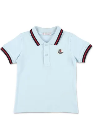 Moncler Playera tipo polo de piqué con bordes a rayas