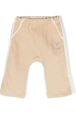 VERSACE Pants con capitonado de rombos