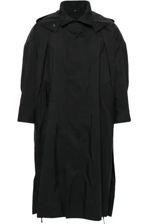 Issey Miyake Impermeable ligero con capucha