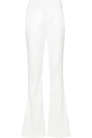 GENNY Pantalones acampanados con detalles de lentejuelas