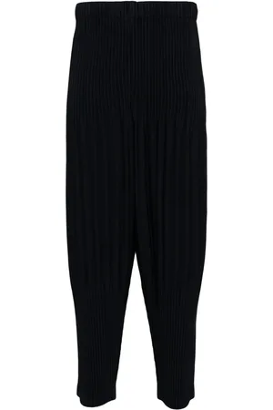 Issey Miyake Pantalones tapered con pinzas