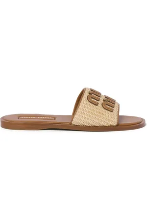 Miu Miu Flip flops con parche del logo