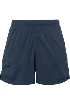 Jil Sander Shorts de playa con logo estampado