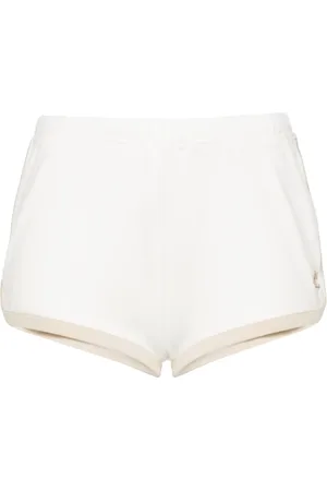 Courrèges Shorts con parche del logo