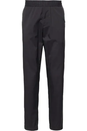 HUGO BOSS Pants slim con diseño impermeable