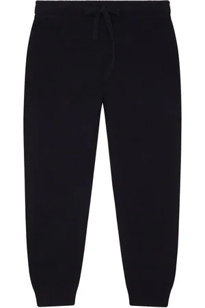 Dolce & Gabbana Pants tapered con placa del logo