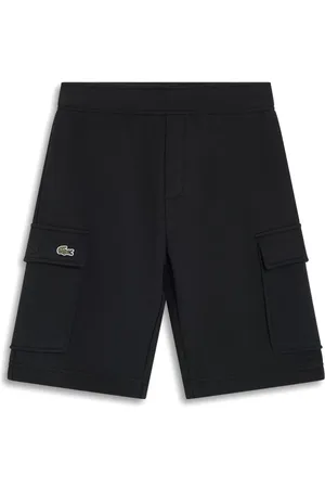 Lacoste Shorts texturizos con cocodrilo bordado