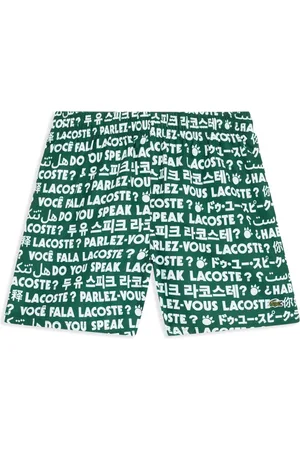 Lacoste Shorts de playa con logo estampado