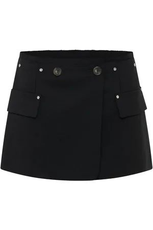 DION LEE Falda corta con detalle de remache