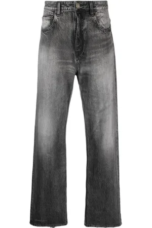 Balenciaga Jeans holgados con efecto lavado