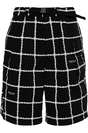 UNDERCOVER Shorts con logo estampado