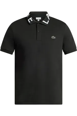 Lacoste Playera tipo polo con aplique del logo