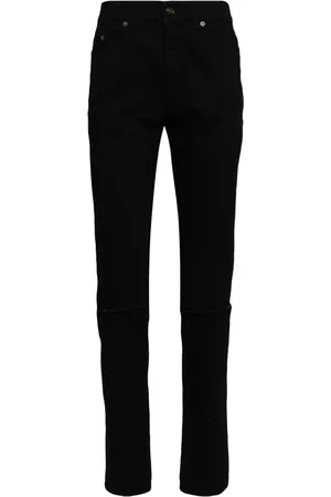 Saint Laurent Jeans slim con detalles rasgados
