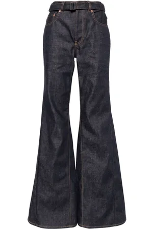SACAI Jeans acampanados con tiro medio