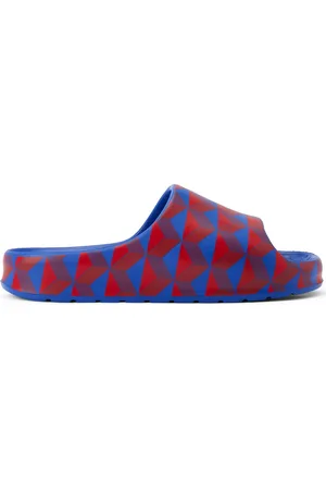 Lacoste Flip flops abiertos con estampado geométrico