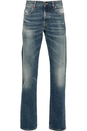 Saint Laurent Jeans slim con tiro bajo