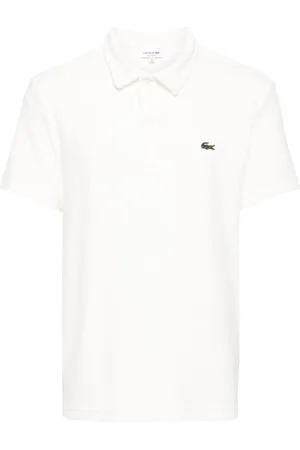 Lacoste Playera tipo polo de terciopelo con aplique del logo