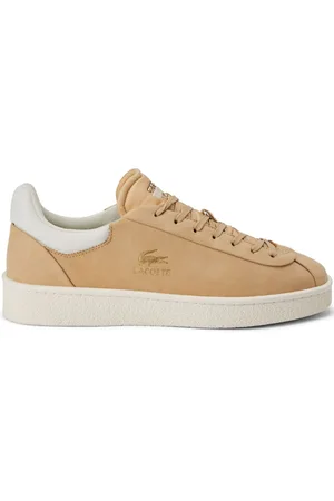 Lacoste Tenis con agujetas y sello del logo