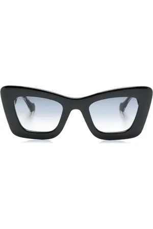 Gucci Lentes de sol con armazón estilo mariposa