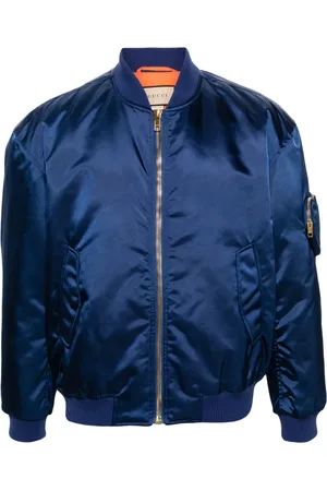 Gucci Chamarra bomber capitonada con parche de eslogan