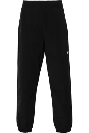The North Face Pantalones tapered Easy Wind