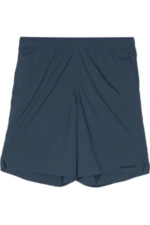Jil Sander Shorts de playa con logo estampado