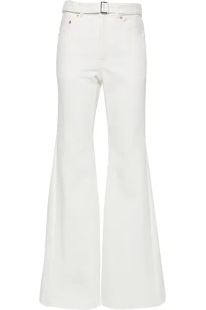 SACAI Jeans acampanados con tiro medio