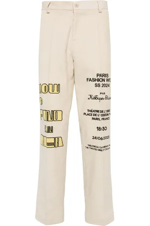 KIDSUPER STUDIOS Pantalones de pana con motivo bordado