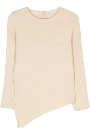 By Malene Birger Top texturizado con dobladillo asimétrico