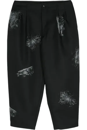 Comme des Garçons Pantalones con efecto de pintura en espray