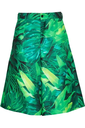 Comme des Garçons Shorts con hojas estampadas