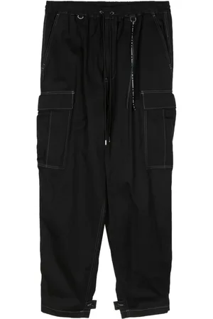 MASTERMIND JAPAN Pantalones con estampado de calavera