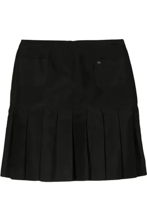 CHANEL Falda corta de seda plisada 2005