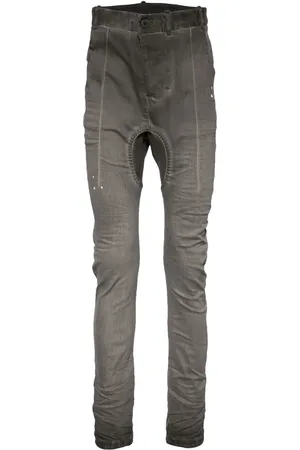 11 BY BORIS BIDJAN SABERI Pantalones skinny drop crotch