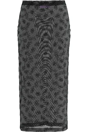 MACCAPANI Falda semitraslúcida The Overkirt