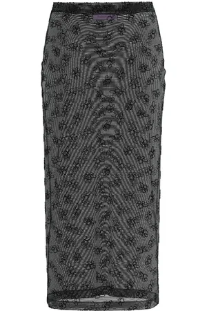 MACCAPANI Falda semitraslúcida The Overkirt
