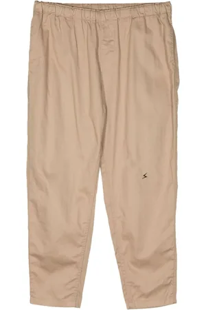 UNDERCOVER Pantalones tapered con pretina elástica