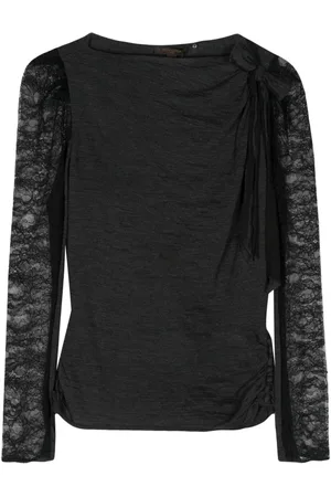 LOUIS VUITTON Top con mangas transparentes