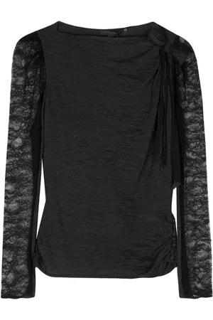 LOUIS VUITTON Top con mangas transparentes