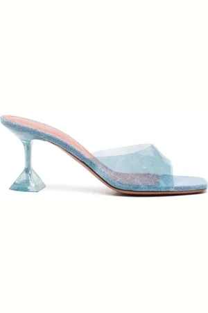 Amina Muaddi Mules Lupita Glass con tacón de 70mm