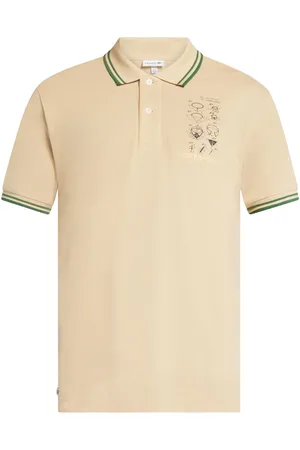 Lacoste Playera tipo polo con eslogan bordado
