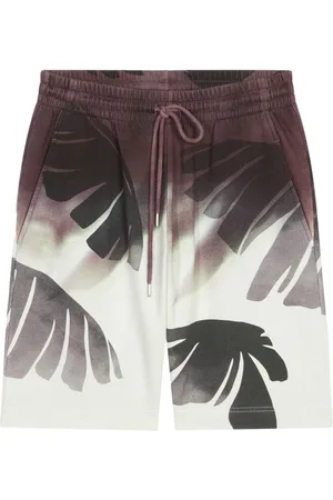 DRIES VAN NOTEN Shorts deportivos con palmeras estampadas