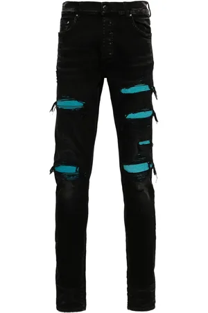 AMIRI Skinny jeans con aplique