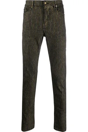 Saint Laurent Jeans con rayas metalizadas