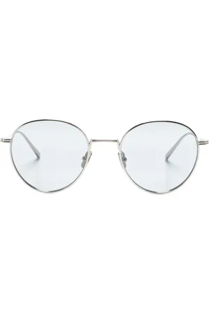 Totême Lentes de sol con armazón redonda y logo grabado