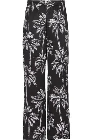 Balmain Pantalones satinados con palmeras estampadas