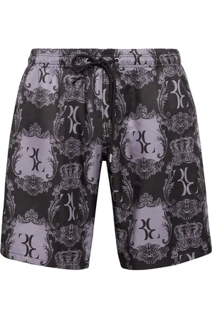 BILLIONAIRE Shorts de playa con estampado gráfico