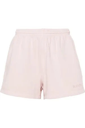 ROTATE Shorts deportivos con logo bordado