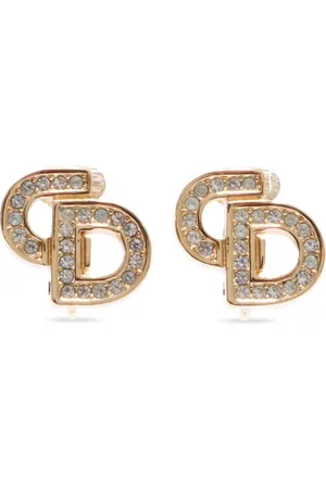 Dior Aretes de clip CD bañados en oro con strass